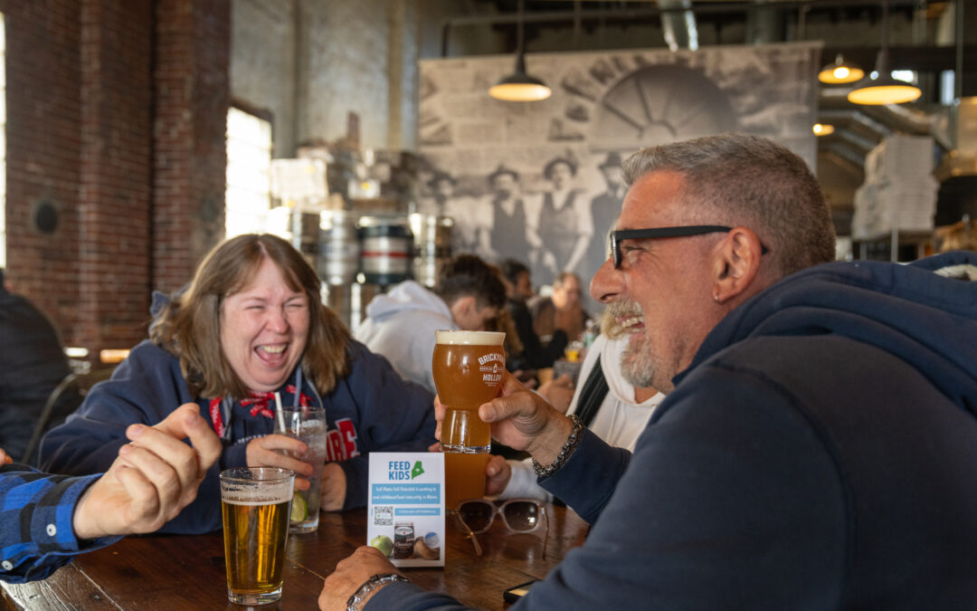 Family enjoying food and drink at Brickyard hollow