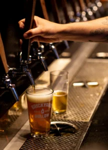 Man pouring brickyard hollow beer